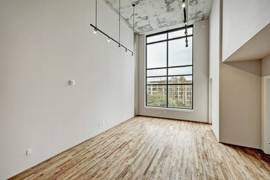 Fantastic walls for large art collections, lustrous hardwood flooring and remote controlled custom draperies.
