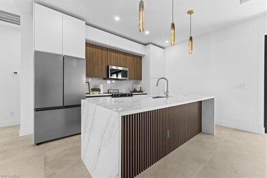 Kitchen with appliances with stainless steel finis