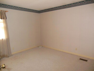 This bedroom has a bath with it also.