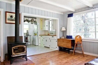 Sunlight filled, open concept living space.
