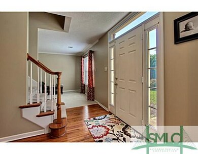 Foyer. Open Foyer Leads Upstairs to Bedrooms and D