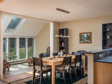 Open concept living, dining and kitchen areas make