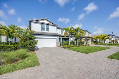 View of front of home with a front yard, decorativ