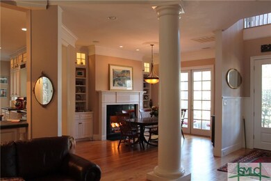 Elegant yet cozy dining room with fireplace featur