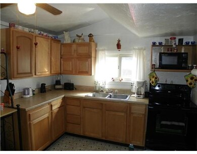 Kitchen. Attractive Oak cabinets, double stainless