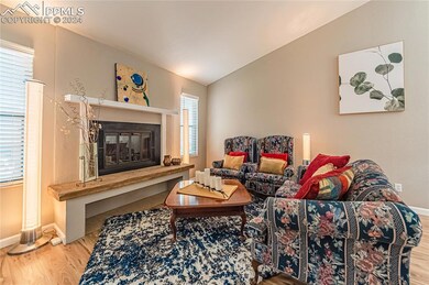 View of the Living Room with stylish wood-burning 