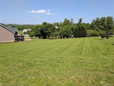 Wonderful buildable nearly half acre lot on paved 