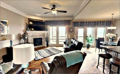 Impressive great room with fireplace, lots of wind
