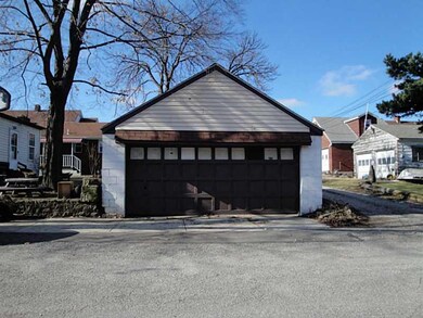 Exterior Front. TWO CAR DETACHED GARAGE.