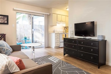 Living room with light wood-style floors