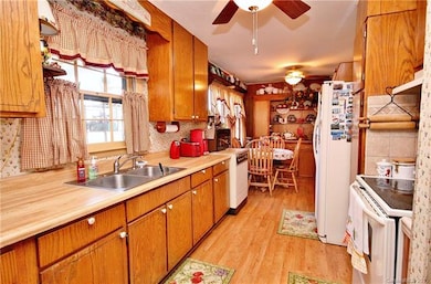 Galley Kitchen opens to Dining area.