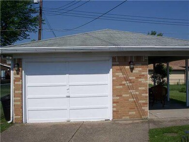 Parking Lot/Garage. 1.5 car garage showing the pat