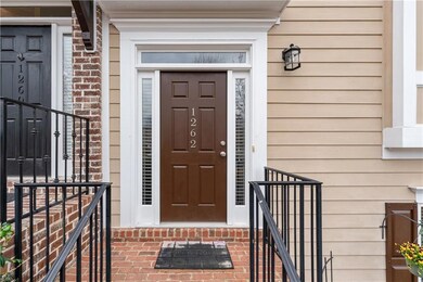 Property entrance with brick siding