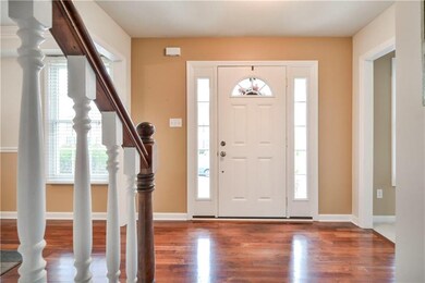 Welcome!   Foyer with American Cherry Hardwood Flo