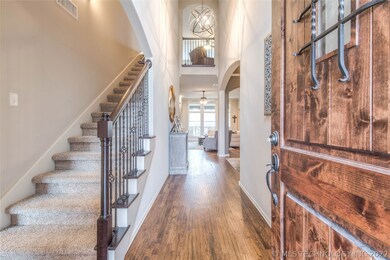 Grand entrance with soaring ceilings.