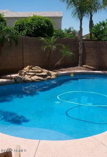 Large Pool with Natural Rock Waterfall