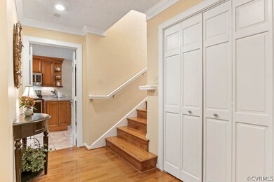 Stairs fromentry to the mail level  with hardwood