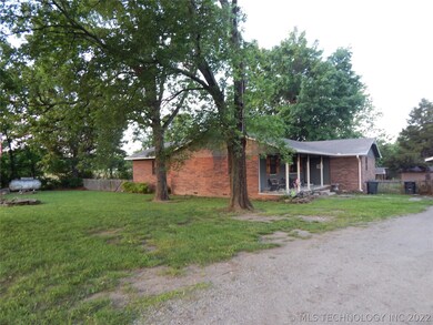 House as you are entering the driveway