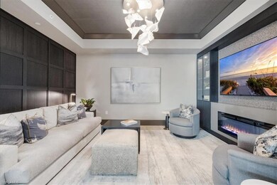 Lounge area with custom built-ins and paneled wall