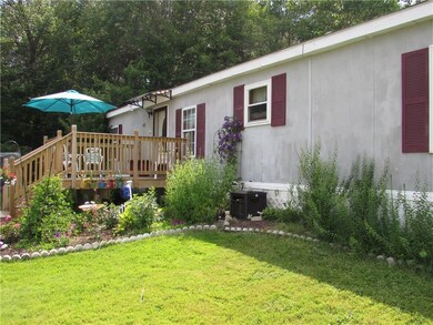 Beautifully landscaped with a new deck!