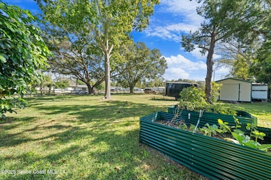 1035 S Mars Ct, Titusville, FL 32796 - photo 5