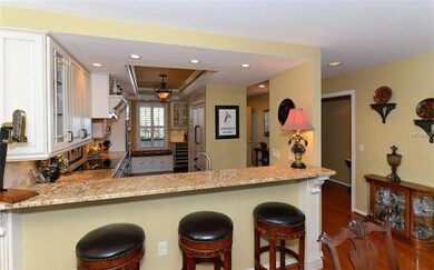 Gorgeous remodeled kitchen with lighted coffered c