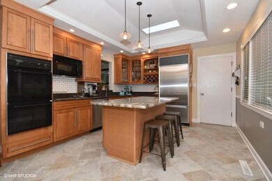 Kitchen with soft close cabinetry, beautiful grani