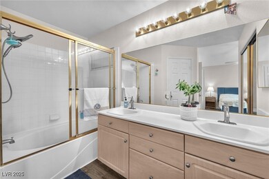 Bathroom featuring connected bathroom, double vani