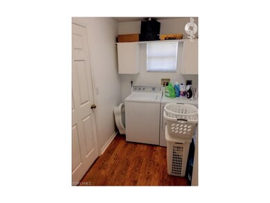 In residence oversized laundry room leading to 2 c