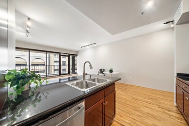 Black granite countertops and shaker style wood ca