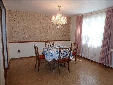 dining room with a large window to let in all the 