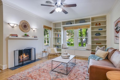 Living area featuring wood finished floors, built