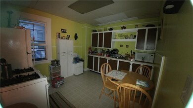 Eat-In-Kitchen. Gas oven range. Fridge and white s