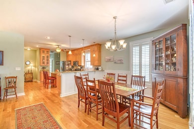 Dining area featuring recessed lighting, visible v