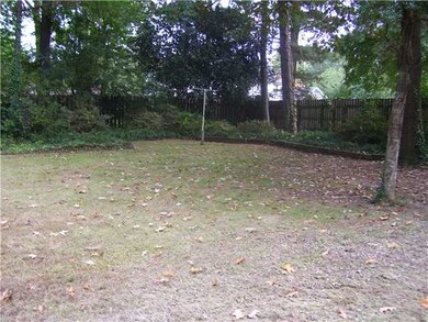 Landscaped back yard for enjoyment looking from pa