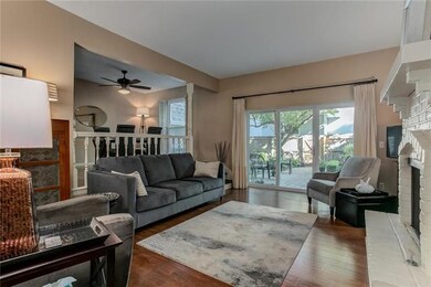 Living room opens to patio and gas fireplace for w