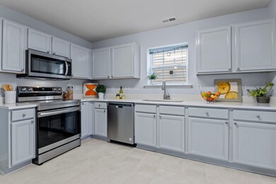 New granite and SS appliances