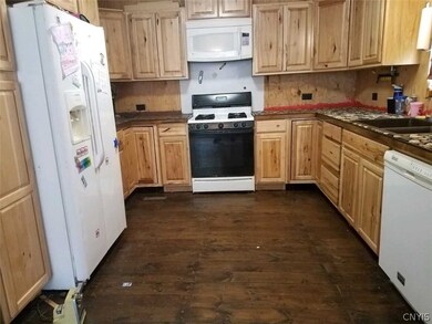 Kitchen with all new cupboards, sink, and unique s