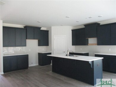 KITCHEN WITH GRANITE COUNTER TOPS. STAINLESS STEEL