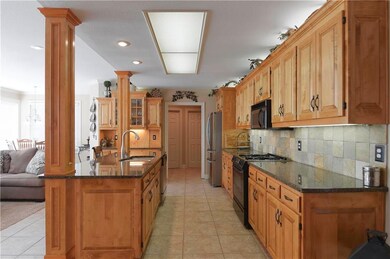 Additional view of the kitchen with tile floor....
