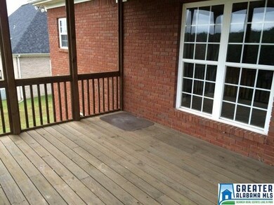 LARGE COVERED DECK AND AN OPEN GRILLING DECK