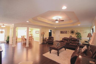 Another view showing off the large living room and the formal dining area. 