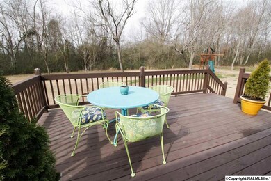 YOU WILL ENJOY THE COUNTRY FEEL WITH CITY CONVENIENCES!  THE NEIGHBORHOOD OFFERS SIDEWALKS FOR EVENING WALKS!  THE DECK SHOWN HERE IS PERFECT FOR BBQS!