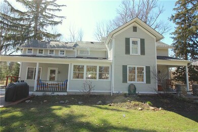 Left side view of house shows the new back porch.