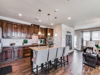 Spacious kitchen includes center island with breakfast bar!