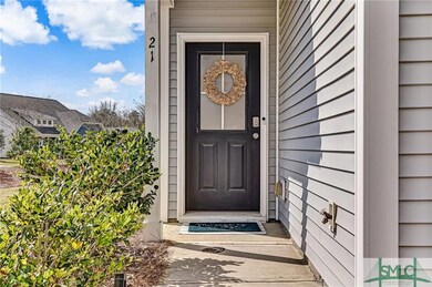 Side entry with large side yard being an end unit.