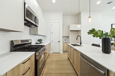 Explore this modern kitchen featuring sleek cabine