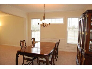 Exterior Front. Elegant dining room features majestic pillars, wainscotting and beautiful transom windows to let the light in!