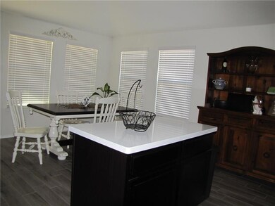 NICE SIZE CENTER ISLAND WITH QUARTZ TOP