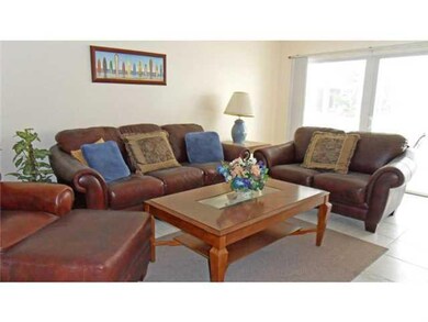 Living Room. Hurricane windows throughout